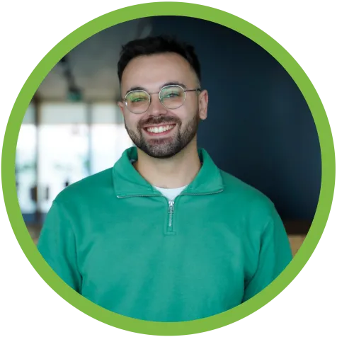 Employee Tomás smiling to the camera