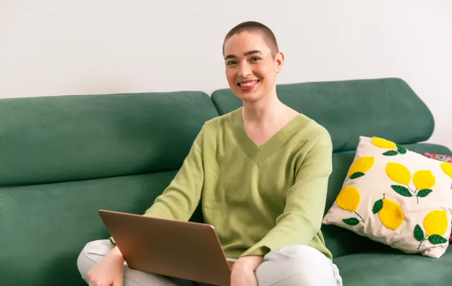 Person working at home smiling to the camera