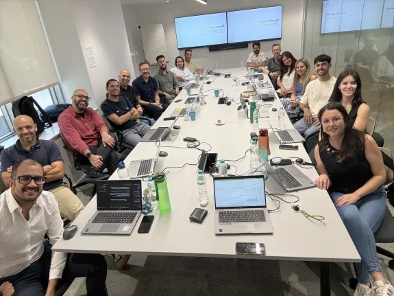 Colleagues at unit4 collaborating in a meeting room